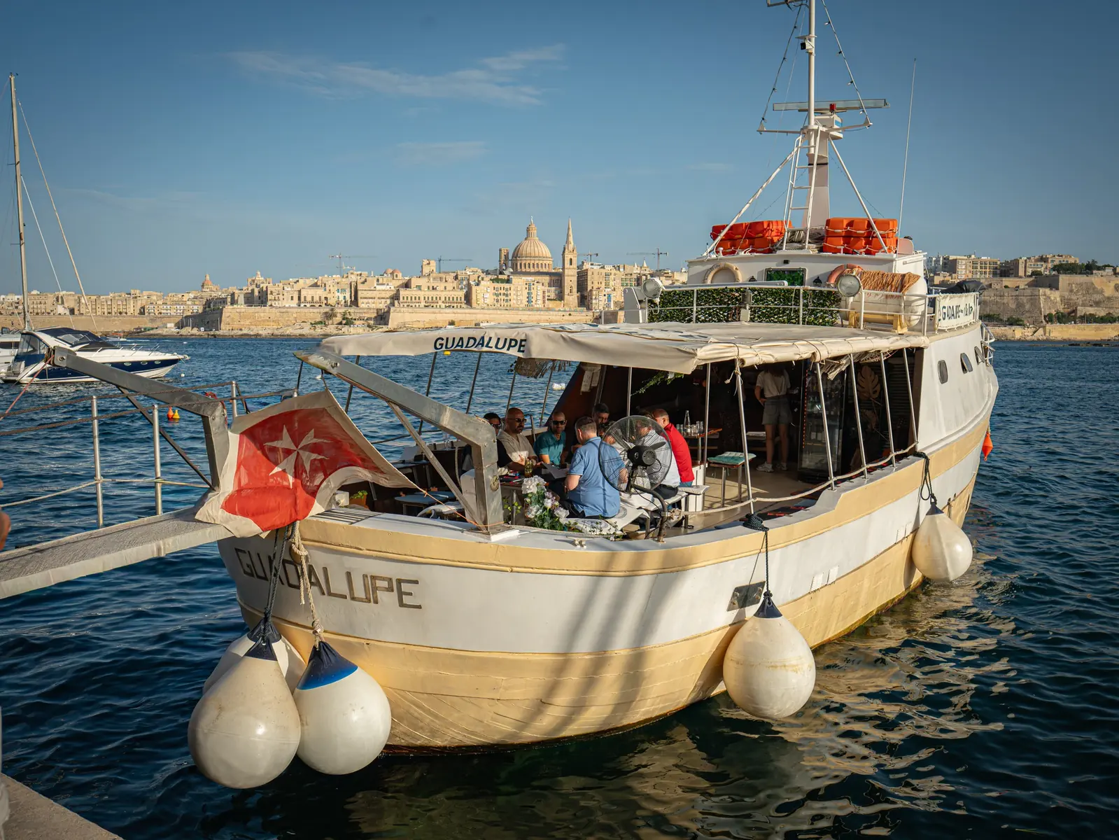 Guadalupe boat bar on the harbor with Valletta in the background