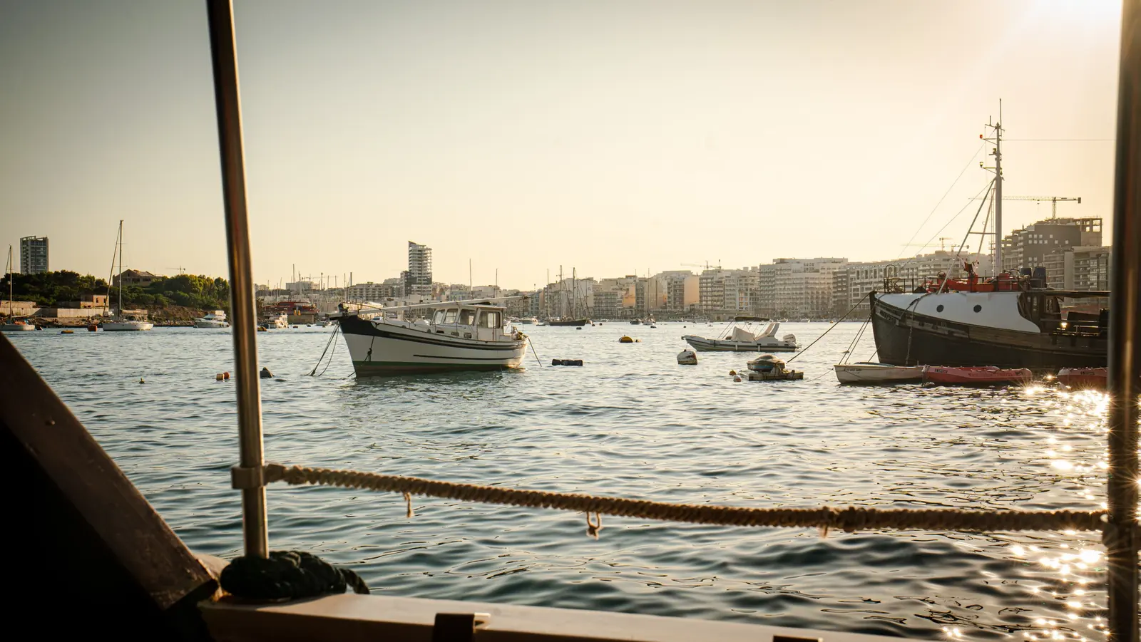 Sunset harbor view from inside Guadalupe boat bar